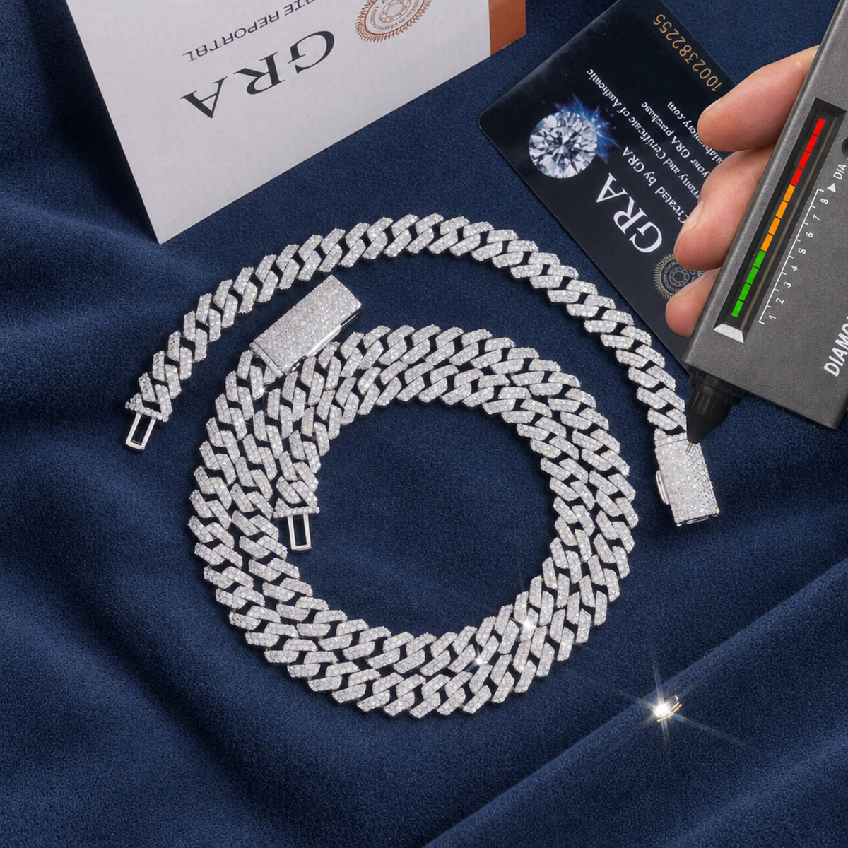 10mm Miami Cuban Bracelet with GRA certificate card and a diamond tester reading on the stones