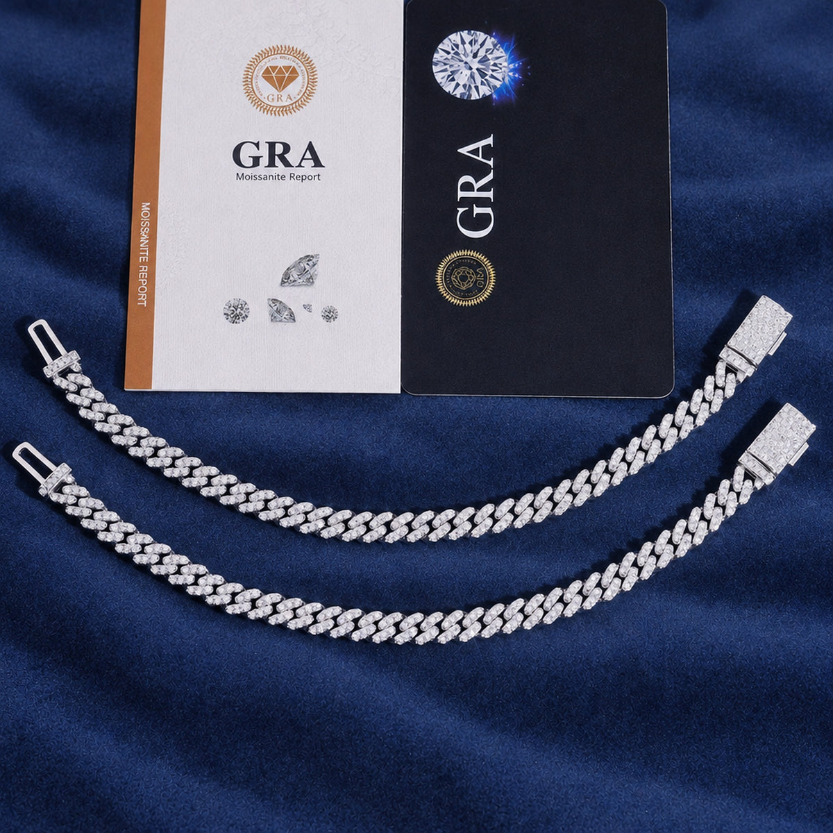 6mm Cuban link bracelets on navy suede beside the GRA stone report