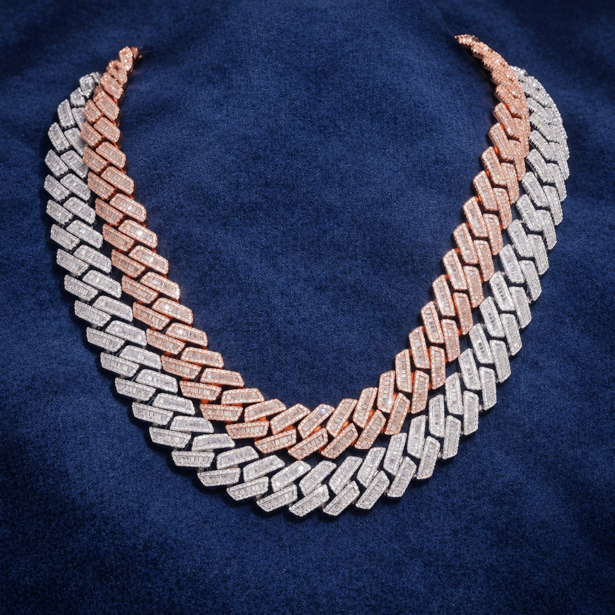 18mm baguette Cuban link chain worn on a display neck against navy suede