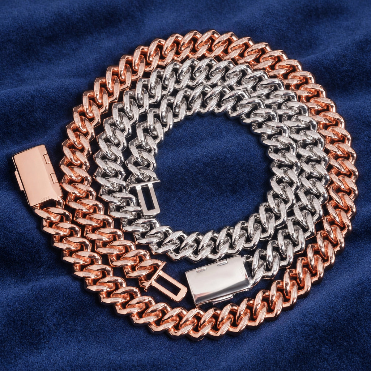 18mm two-tone baguette Cuban chain coiled flat on navy suede