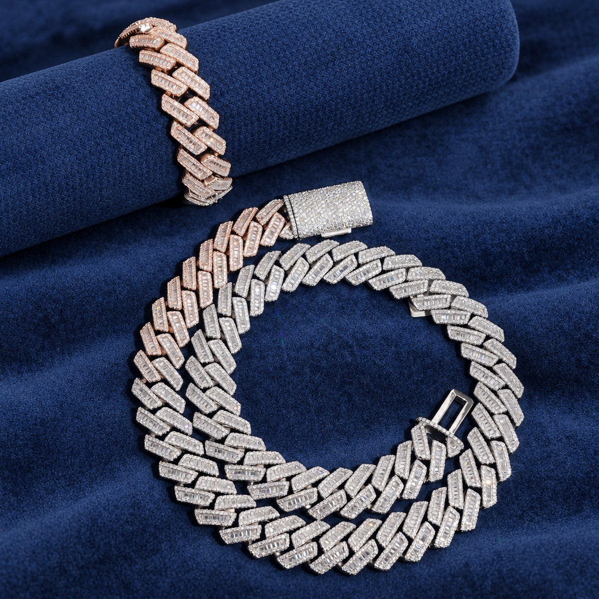 18mm baguette Cuban chain draped over rolled navy suede
