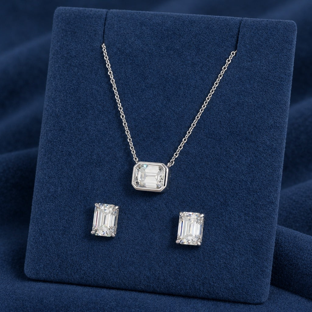 Emerald Cut Set displayed together, pendant above the matching emerald-cut stud earrings