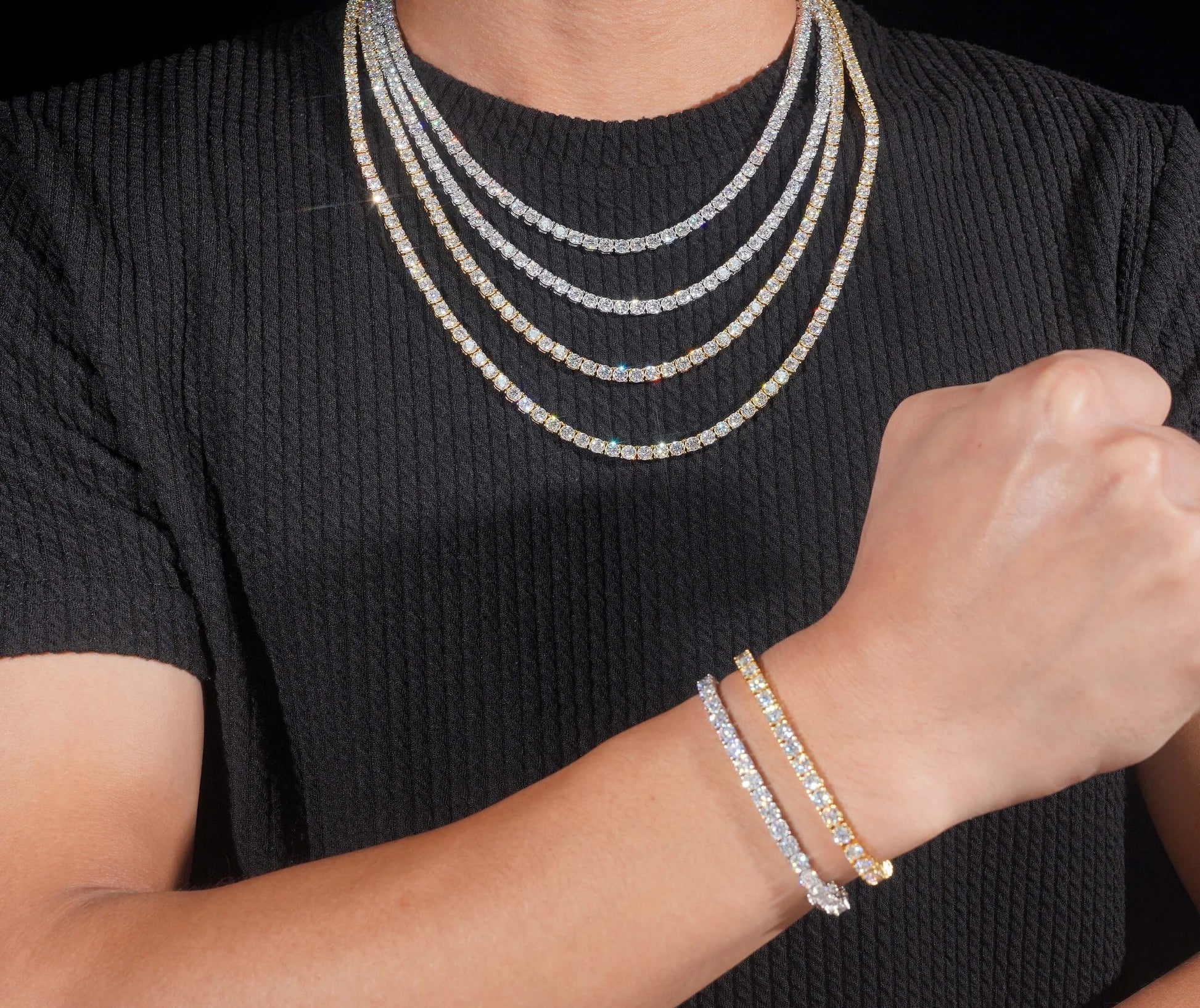 Tennis chains worn on neck showing multiple width and color options