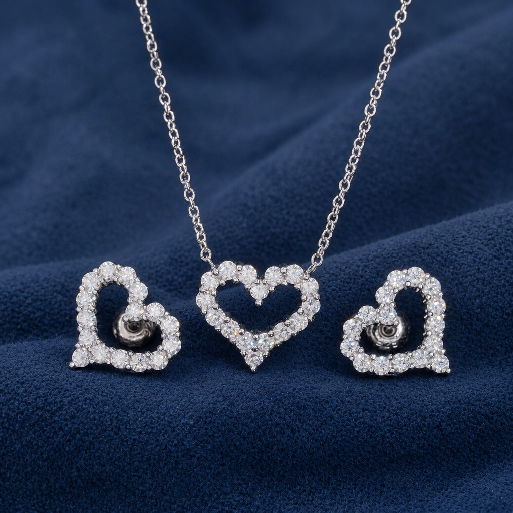 Iced Heart Set laid out straight on, pendant between the two matching heart studs