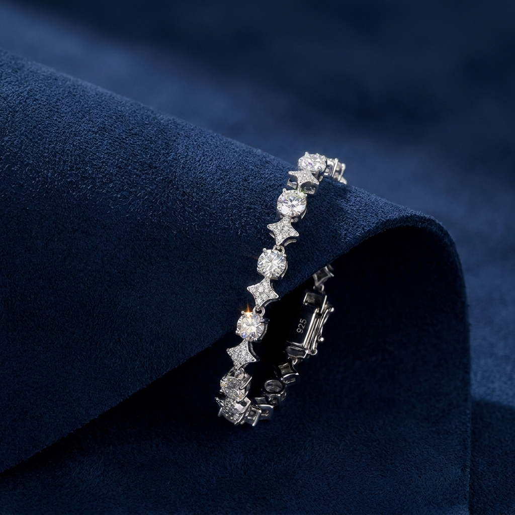 Star Link Tennis Bracelet draped showing 925 silver stamp on dark navy suede