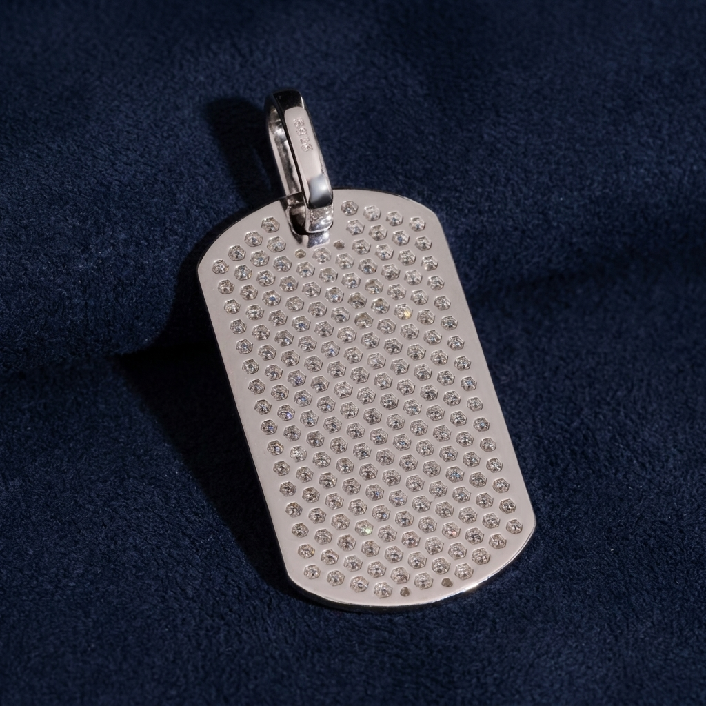 Iced Out Dog Tag Pendant back view showing honeycomb setting and 925 stamp on dark navy suede