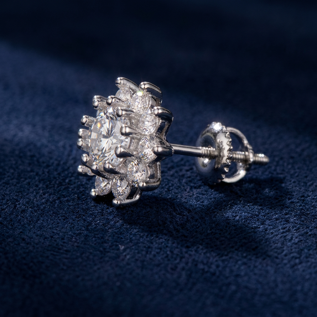 Macro profile shot of flower cluster stud earring showing screw-back threading, 925 silver, on navy suede