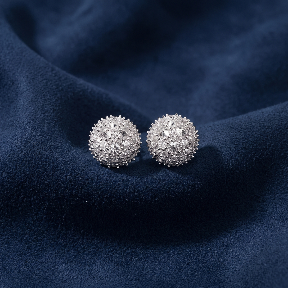 Inverted-set moissanite cluster stud earrings showing spiked crushed-ice texture