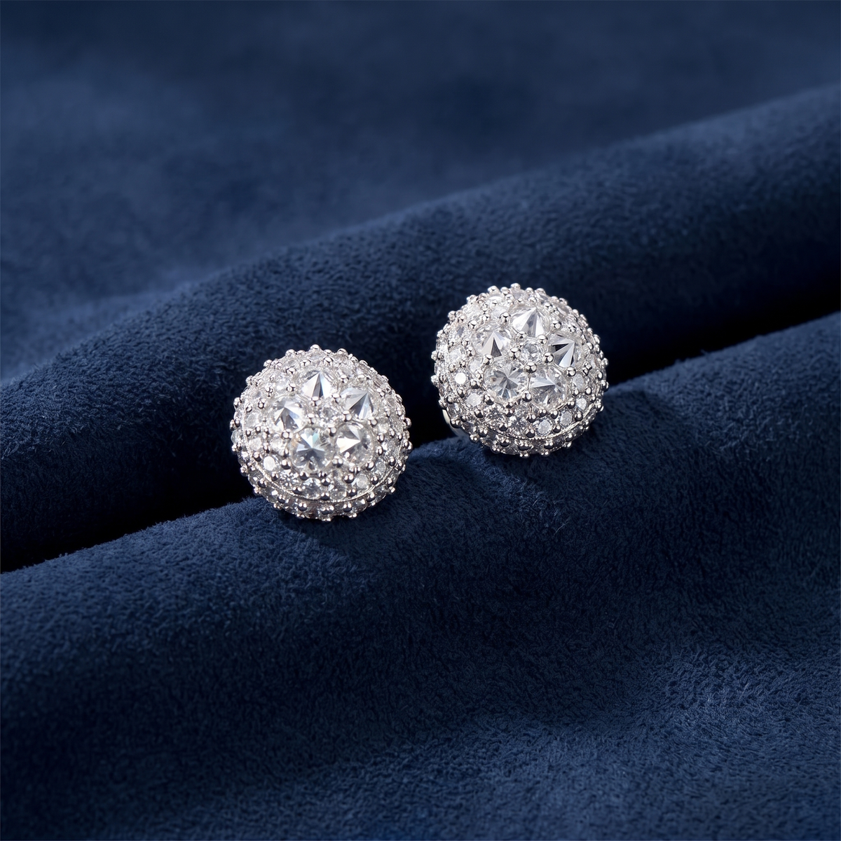 Angled view of 925 silver upside down cluster studs with pointed moissanite