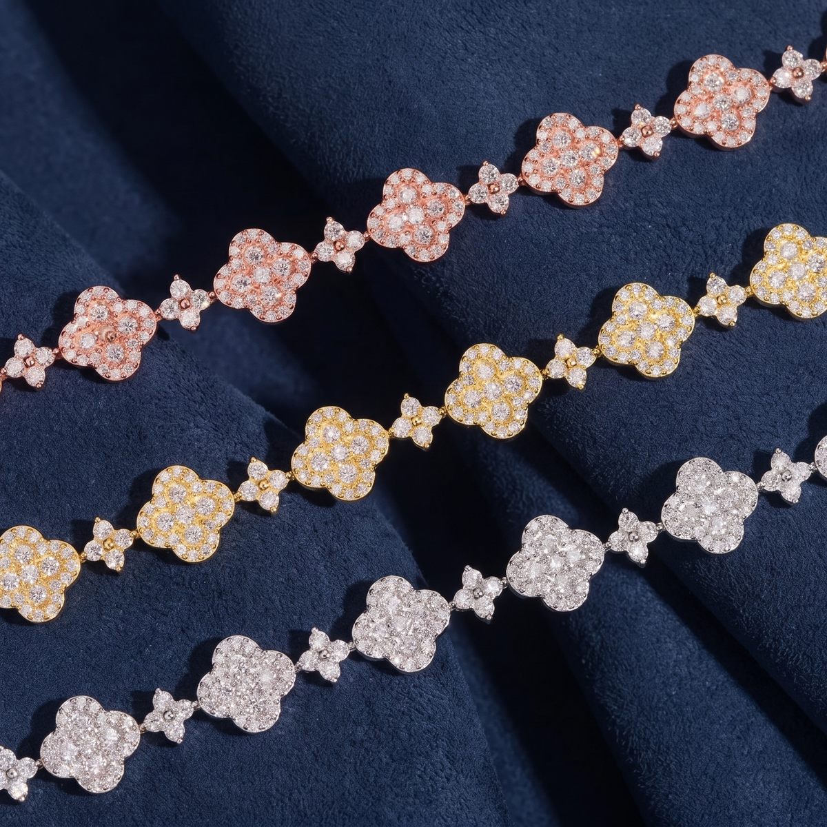 Close detail of pave flower clusters and four-stone connector links in moissanite
