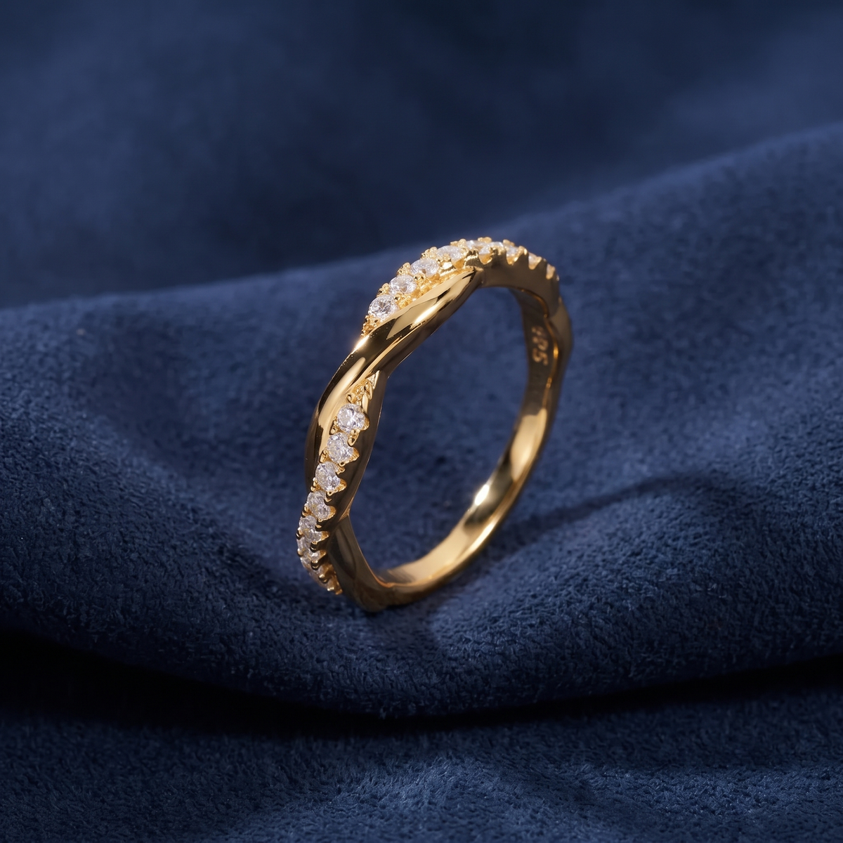 Angled view of twisted moissanite band ring showing the S925 stamp inside the band